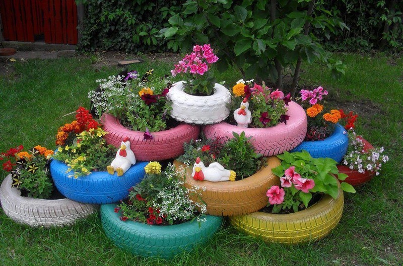 Blomsterhager i landet: typer, hvordan du gjør det selv, planteskjemaer med navn