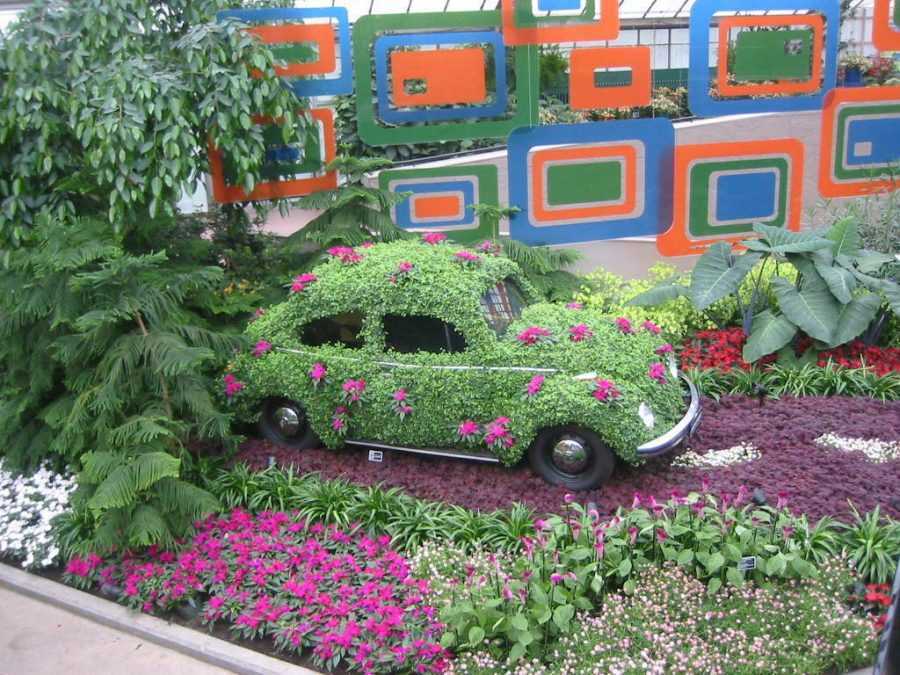 Blomsterhager i landet: typer, hvordan du gjør det selv, planteskjemaer med navn