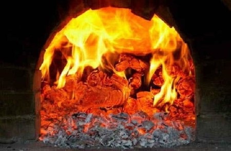 Hvordan varme en komfyr med kull: trinn for trinn + tips for tenning