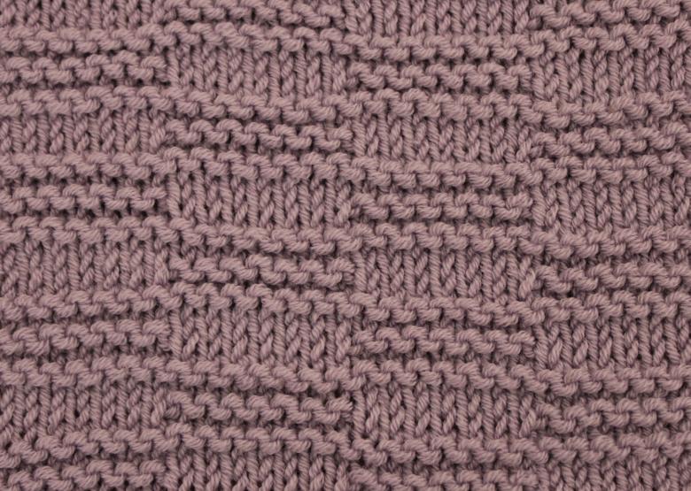 Dichte Häkel- oder Strickmuster mit Diagrammen und Beschreibungen