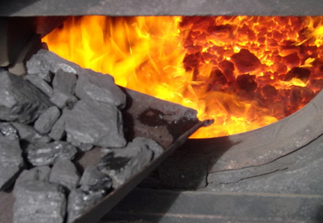 כיצד לחמם תנור עם פחם